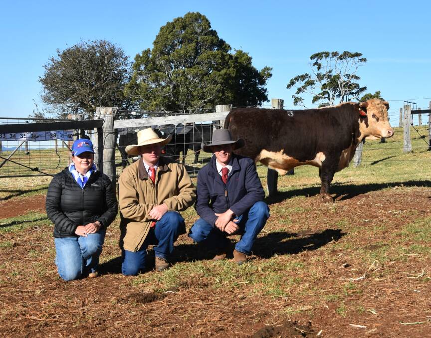Kayla and Greg Tyler, Hillview Herefords with Jonny Cowen, Donovan Livestock & Property with the top priced Hereford bull Hillview Schaffer S055 selling for $10,000 
