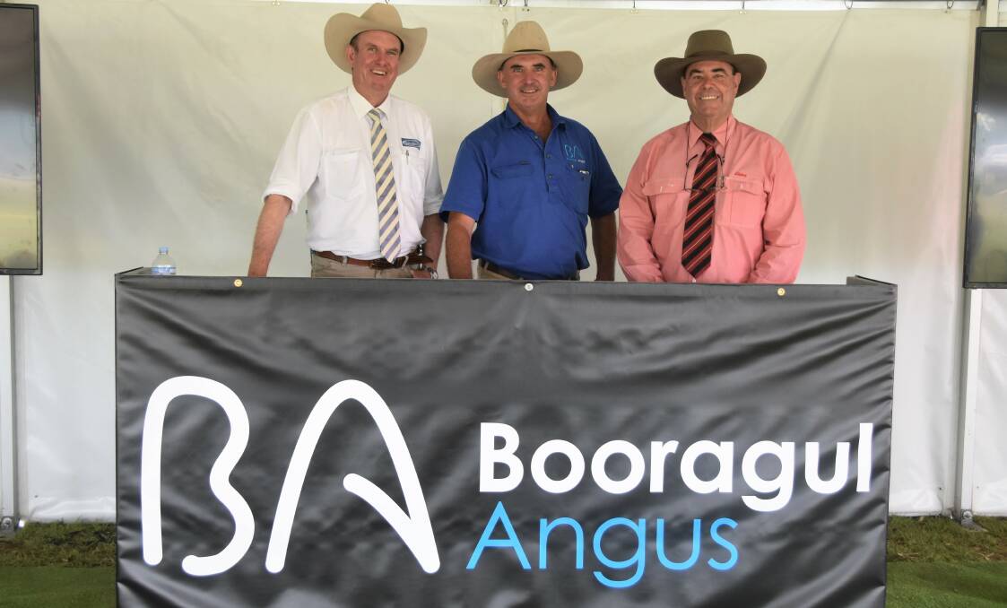 Auctioneer, Paul Dooley, Tamworth with Booragul Angus Stud Principal, Tim Vincent, Gunnedah and Elders Stud Stock representative Brian Kennedy, Tamworth all smiles after a successful day.