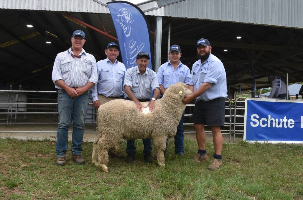 The $8600 top-priced ram with Airlie Merino principal Murray Power, Harold Manttan of AWN, top buyer James Stewart, Moray stud, Guyra, and agents Adam Nordstrom and Todd Clarke of Schute Bell Eggert and Co, Guyra