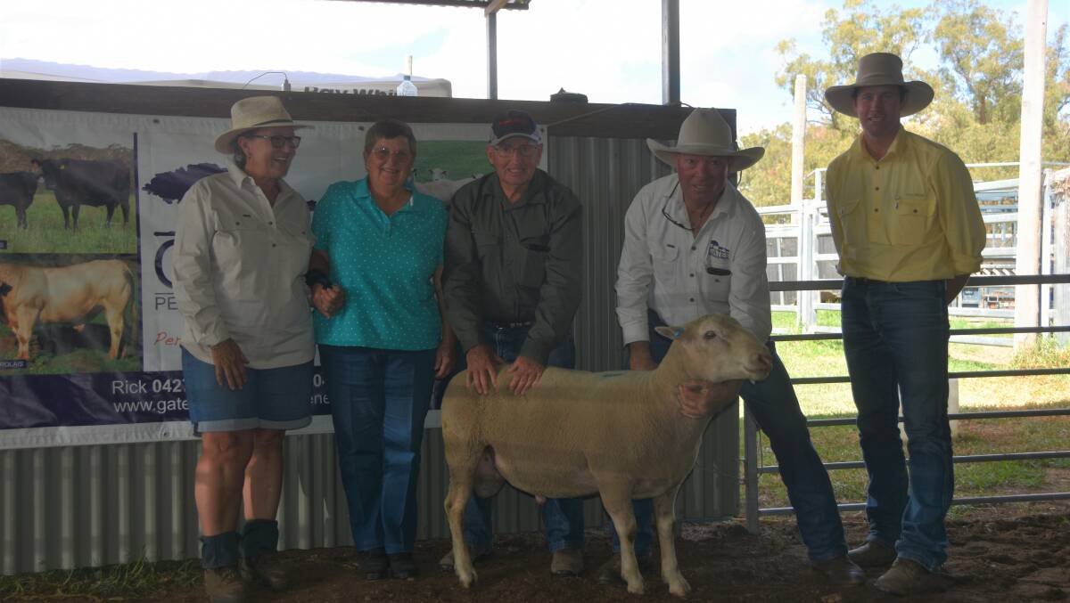 The $3000 top ram with vendor Julie Gates, buyers Julie and Tony Partridge, Walcha, vendor Rick Gates and agent Sam Sewell, Ray White Livestock Guyra/Armidale.