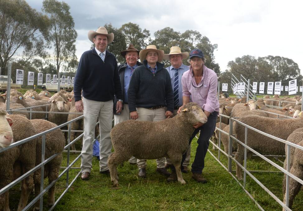 Paul Dooley, Tamworth, Bruce Bright and Tom Pollard, Peter Milling and Co, Dubbo, Chris Clemson, Clemson Hiscox and Co Pty Ltd, Walgett, and vendor John Nadin, Macquarie Dohne Stud, Ballimore, with the $8000 top priced ram. 