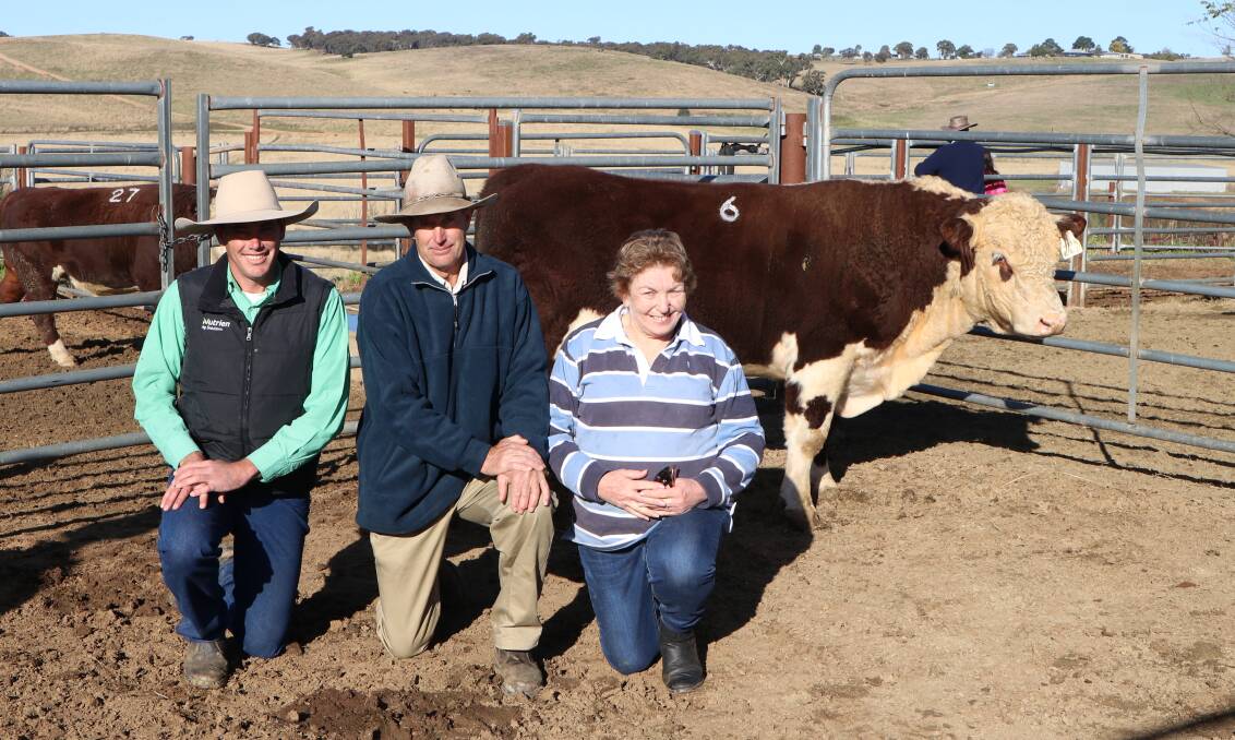 Top priced bull: $16,000 Stanford Remark R041, with selling agent Marcus Schembry, Nutrien Bathurst, and vendors, Michael and Cherly Rutherford, Standford Herefords. 