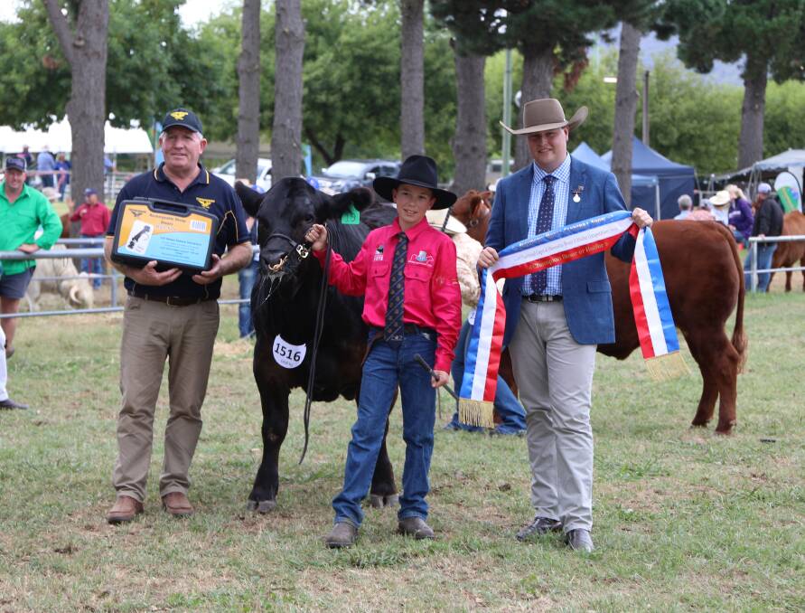 Grand champion led steer with Thunderbird territory manager Graham Williams, Windsor, handler Oscar MrRae, Coonamble High School, and judge Jack Laurie, Breeder Genetics, Moppy. Photo: Kate Loudon