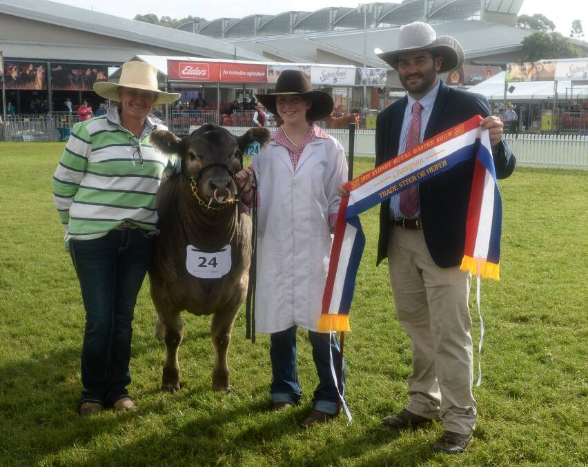 Scots All Saints College's Director of Agriculture and Equestrian, Libby Dawes, Year 10 student Paige Hatton, and judge Chris Dobie, Nutrien Ag Solutions, Scone.

