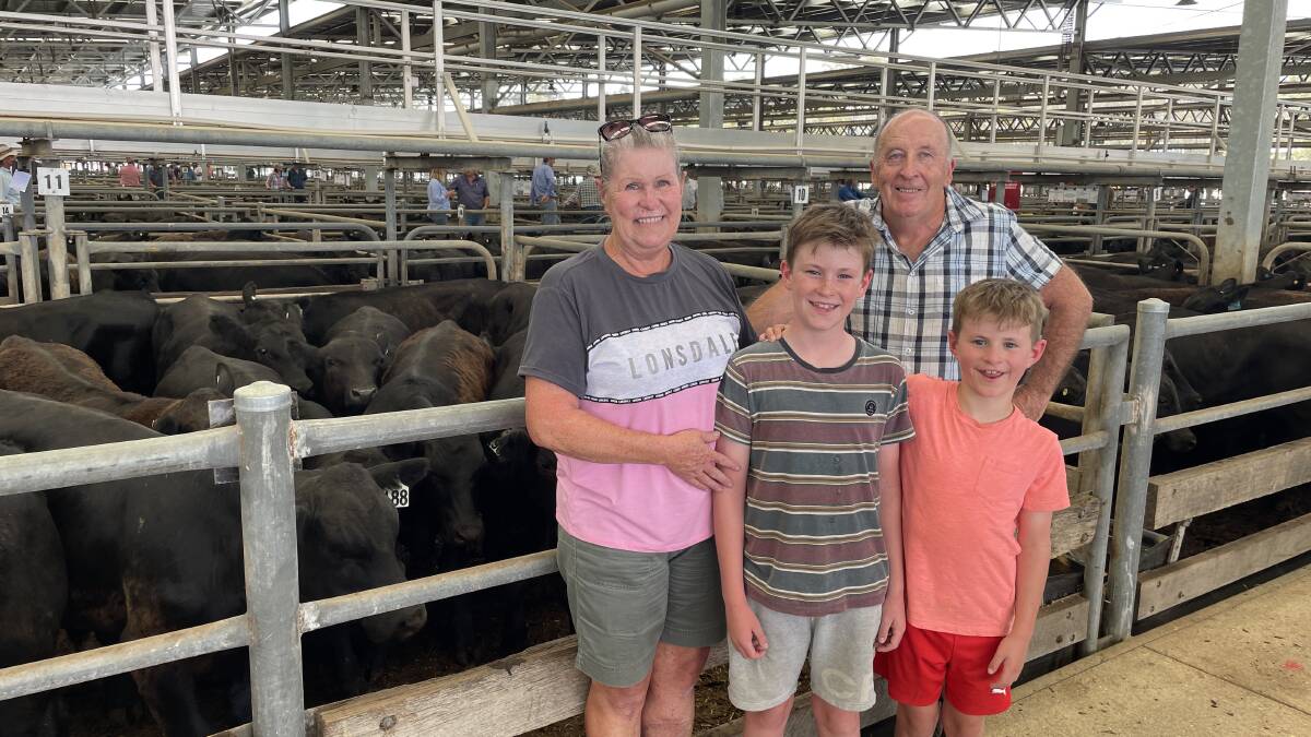 Janine and Tony Simpson, Docker, yarded 40 steers in total at the first Wangaratta feature sale for 2024. With grandsons Xavier (10) and Edward (8) Simpson. Picture by Philippe Perez