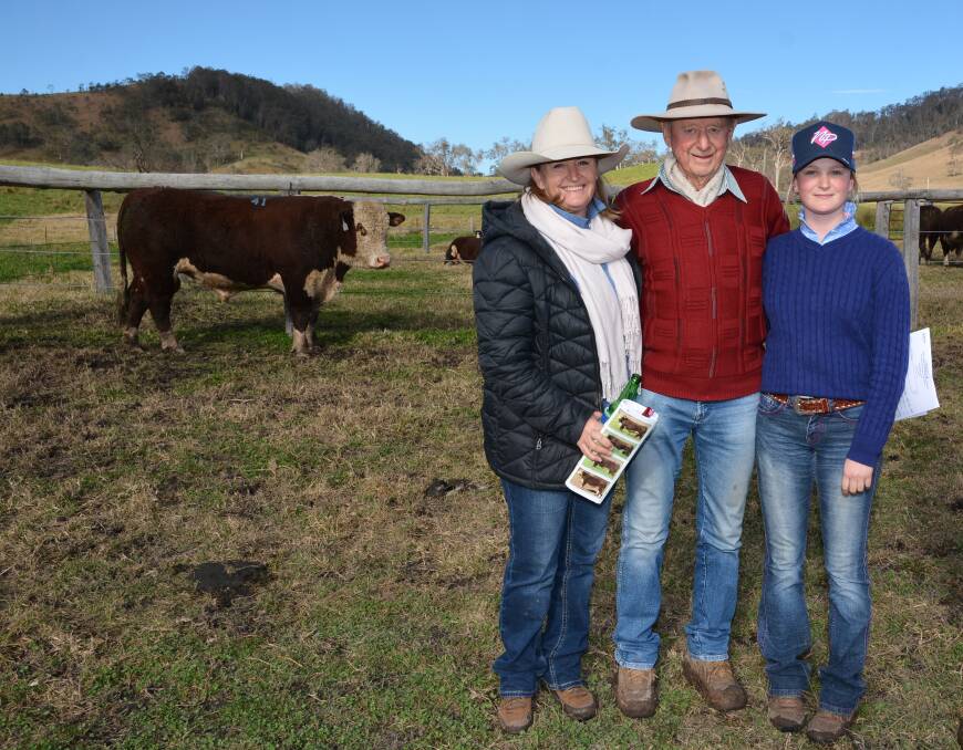 Peter Swatridge, Brangus Park, Nevertire with his daughter Christine and granddaughter Mia and their top-priced Hereford bull at the Curracabark sale.