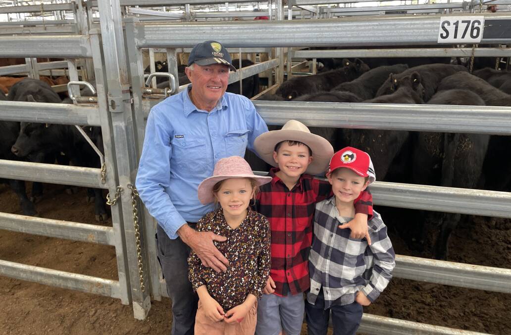 Peter Duff, Duff Grazing, Rob Roy, took his grandchildren, Olivia, Patrick and Alexander, from Armidale to the Inverell weaner sale to see the last of his cattle sell. His Boorooomooka blood steers, averaging 355kg made 432c/kg.