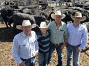 Grant Whatham, Hunter Stock Land, Branxton, Dougal and Josh Evans, Riverside, Vacey and Shannon McCormack, HSL with the Evans family's champion pen of 9 Angus heifers that made 300c/kg to return $1000. Pictures by Simon Chamberlain
