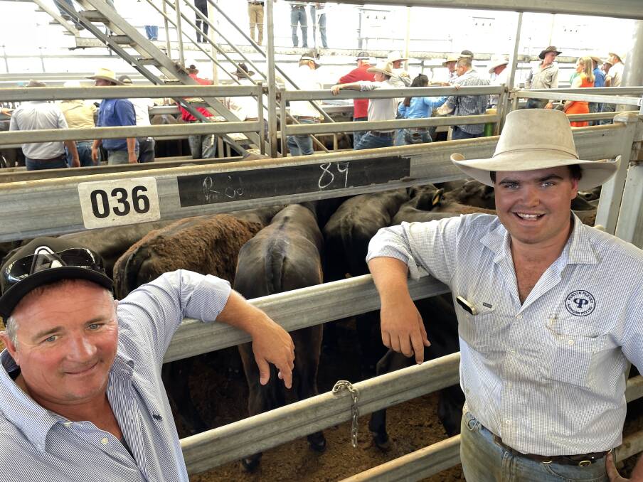 Murray Dale, Westwood, Gulgong sold a pen of 25 Angus/Santa Gertrudis cross steers at Tamworth. With him is nephew and auctioneer Michael Purtle. Picture by Simon Chamberlain
