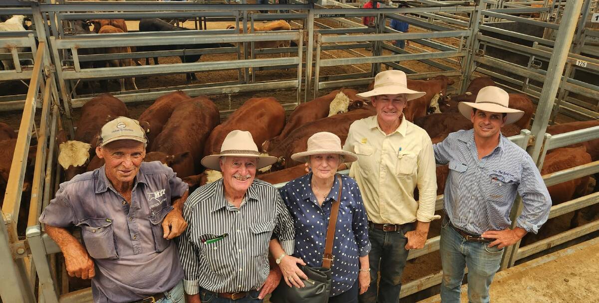 John Hayes, McDonald Bros Transport, chats with Chris and Ruth Norris, Piallaway, who bought these quality Santa Gertrudis-cross sold by SPN and JM Blake, Walcha. With them is their agent, Scott Simshauser, Ray White Rural and Livestock Tamworth and selling agent Sam Payne from Pitt Son's Walcha. Picture by Michelle Mawhinney