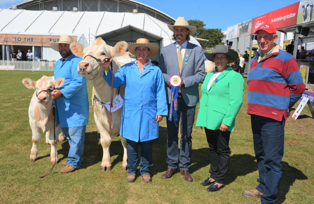 Nigel and Casey Wieck, Delungra, Michael MacCue, RAS, judge Kirrily Johnson-Iseppi, Cecil Plains, Queensland, and owner, Greg Frizell, Wakefield Charolais, Wollomombi. Pictures by Simon Chamberlain 