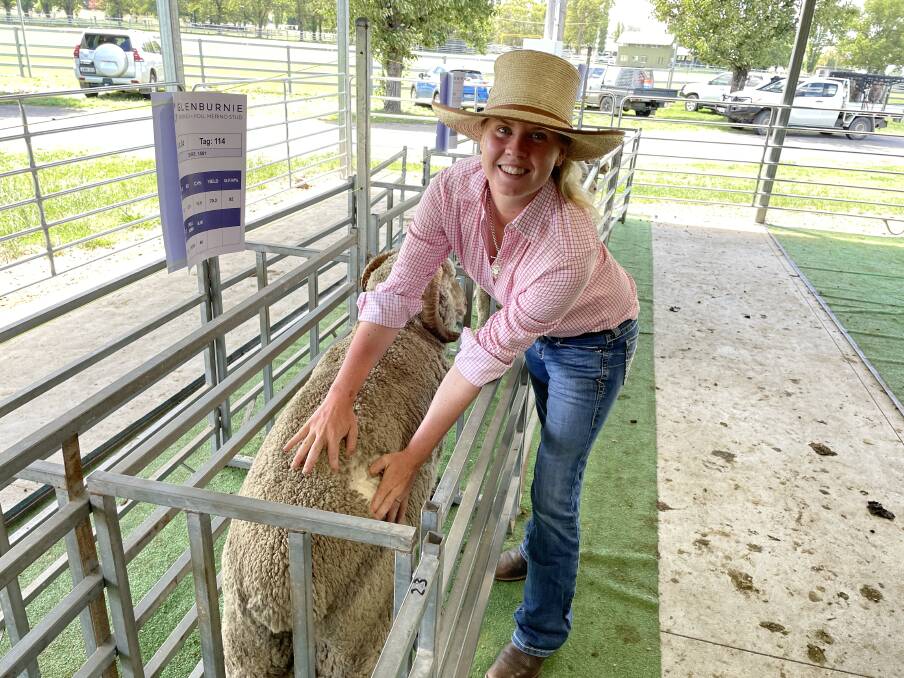 Jasmine Whitten, Coo-ee, Ogunbil, with a ram she bought at the Glenburnie stud sale, Walcha. Picture by Simon Chamberlain