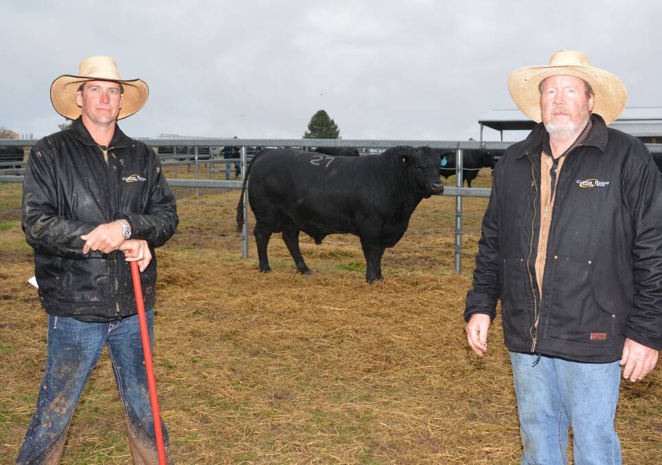 Ben Grabham Clunie Range and principal, Brett Guest with Clunie Range Radford R91, the $85,000 top-priced bull bought online by the Lane Brothers, Wilano Angus, Dunedoo.