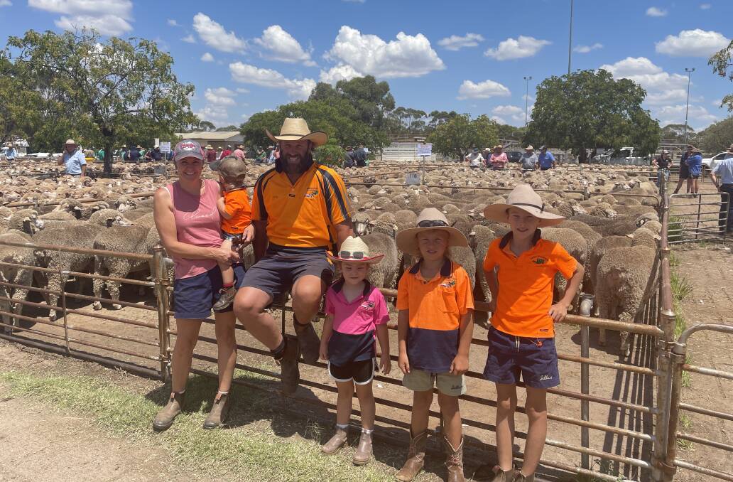 Tessa, Dusty, Craig, Sophie, Billy and Brumby Johnston, West Wyalong, with their pen of 192 July/August 2012 Merino ewes, Pure Austral Eden blood, sold for $188. Photo: Alexandra Bernard