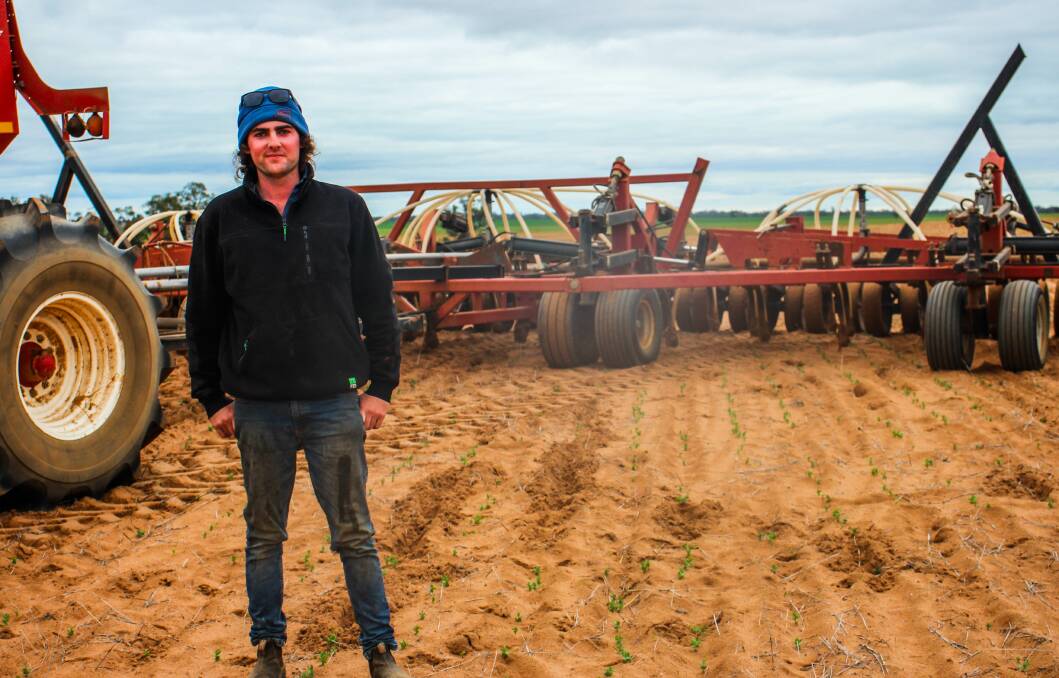 Angus Dunn resowing field peas after the crop was lost to pigs.