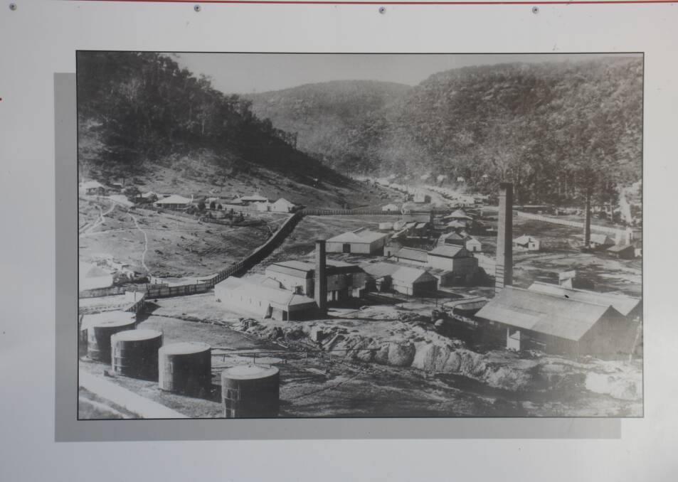 A billboard showing a historic photo of the village of Joadja, a former shale mine in the Southern Highlands. Picture by Alexandra Bernard. 