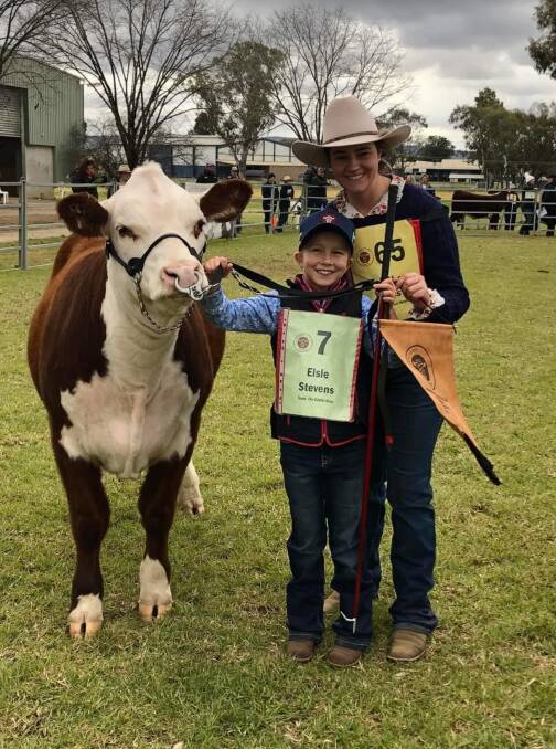 Young Elsie Stevens, Lancaster, with her buddy Tabitha Cross, Indigo Valley, at the Hereford Youth Expo in Wodonga last year, one of the many opportunities for young people in agriculture. Photos: Alexandra Bernard