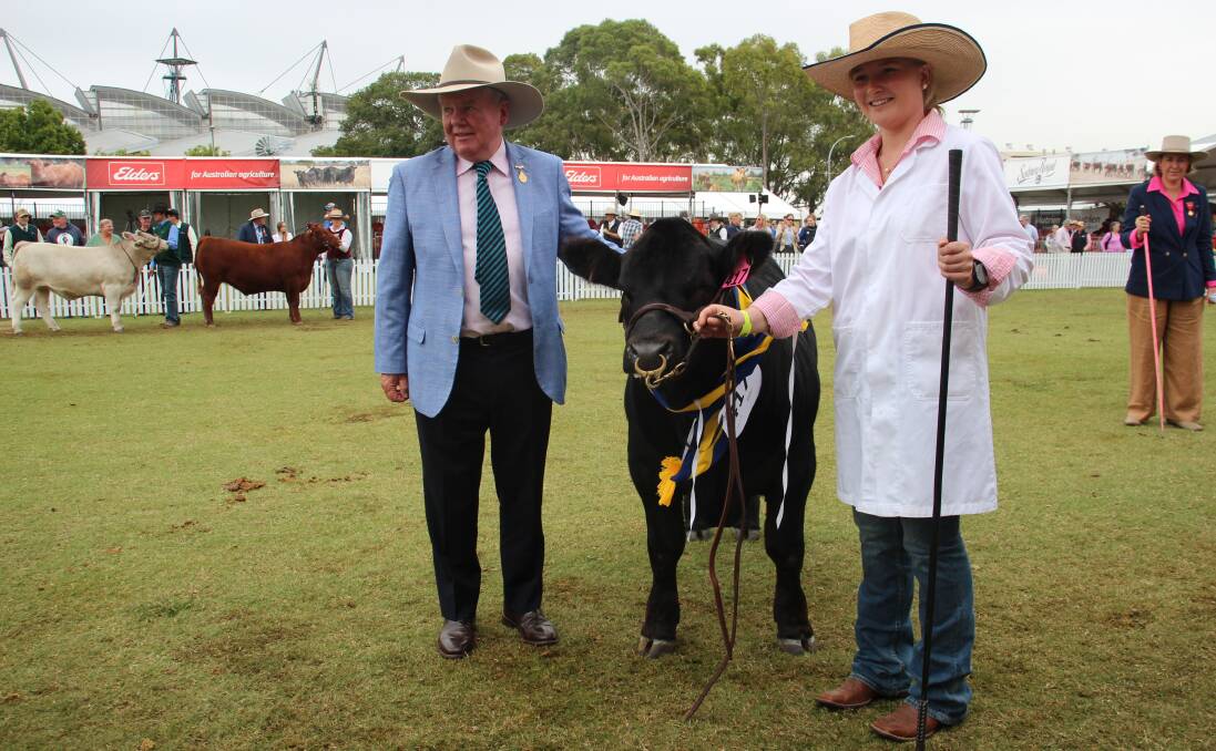Immediate past RAS president Michael Milner, Blayney, and Laura Kirk, Peak Hill, with the reserve champion lightweight steer. Picture by Alexandra Bernard. 