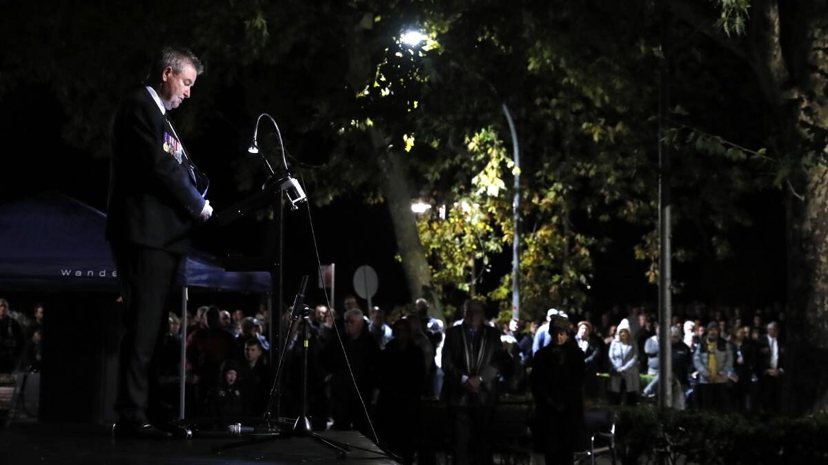 Legacy Wagga secretary and leads a minutes' silence at this morning's Anzac Day dawn service. Picture by Les Smith 