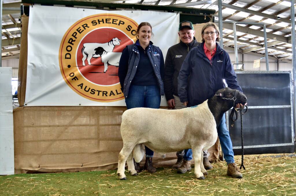 Teeah Bungey, AuctionsPlus, John Settree, Nutrien, Dubbo and Andrea Vagg, Dell African Dumisa stud, Moama, with her $25,000 top priced Dorper ram at the 2022 sale.