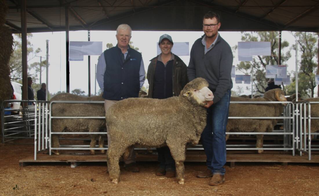 The $4250 top-priced ram with John Croake, AWN Livestock, Rebecca and Hayden Cox, Bocoble Merino stud