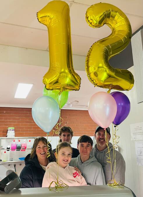 We are family: On Tuesday this week, Kelly, Jools, Rusty, Jarrah and Brett Morrison celebrated 12 years running the butcher shop at Orbost. Picture supplied 