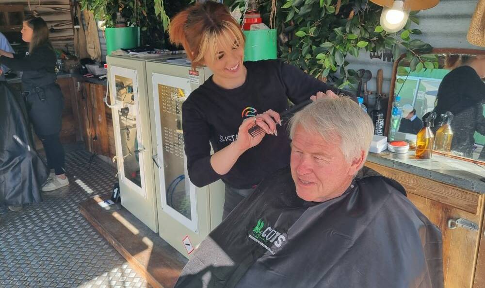 NSW Farmers President Xavier Martin getting a trim in the NSW DPI H2Cuts trailer at Ag Quip. The popular hydrogen-powered haircuts will once again be on offer. Picture via NSW Farmers