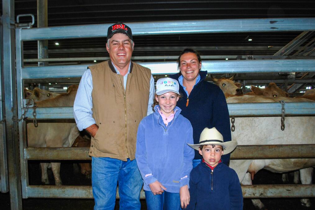 Nick, Belinda, Harriet, 10, and Sandy Bailey, 4, of Panuara, sold a run of 90 cows with calves, including 55 Charbray cows with Angus-cross calves for $1700 that were on agistment at Coonamble. Picture by Rebecca Nadge.
