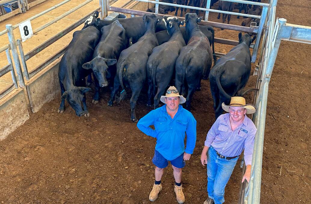 Vendor Mark Leighton, Condobolin, sold 17 Angus/Hereford cows with calves, 506kg, for $1840 a head, and MCC Chudleigh Dobell agent Darcy Howard. Picture by Elka Devney