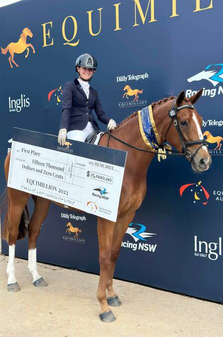 Allie Palmer, Quirindi, with mare Beth receiving a $15,000 first prize cheque at the Equimillion event late last year. Picture by Debbie Palmer 