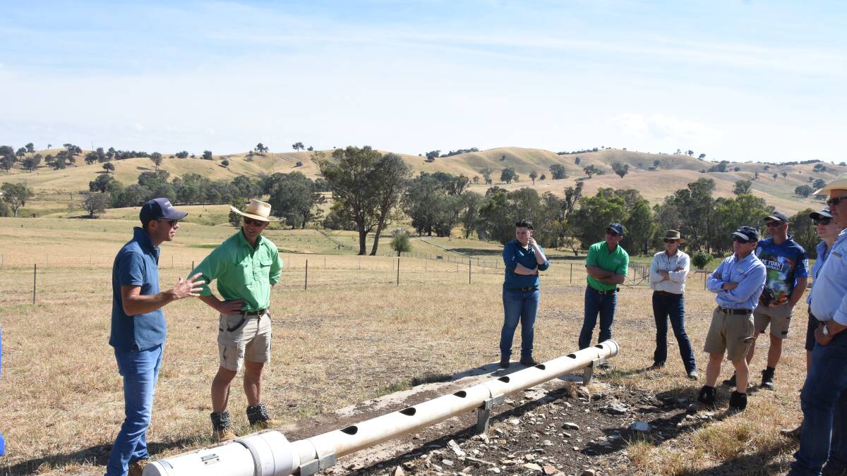Matthew Martin, Old Cobran Poll Merinos, Mullengandra and Jim Meckiff, JM Livestock, Wagga Wagga, dicussing watering options in containment pens at the Strategic Feed Budgeting for Sheep Containment workshop. Photo by Helen De Costa 
