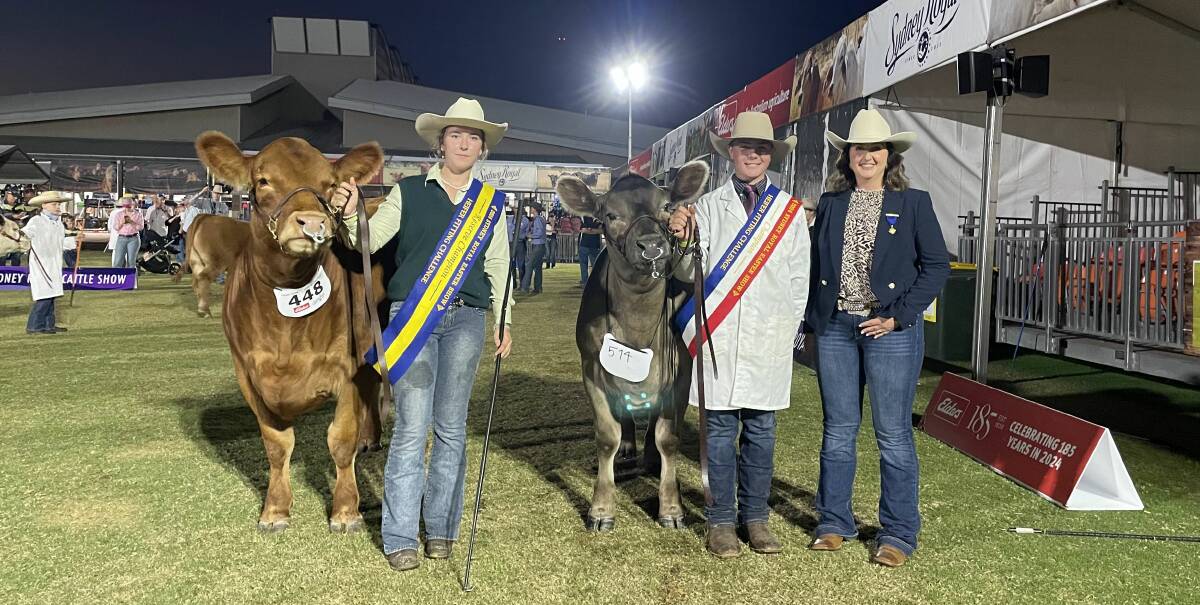 Reserve Champion Sophie Van Teulingen, Nowra High School, and fitting challenge champion Jacob Merrick, Singleton, with judge Kristie O'Brien, Winchester Livestock. 