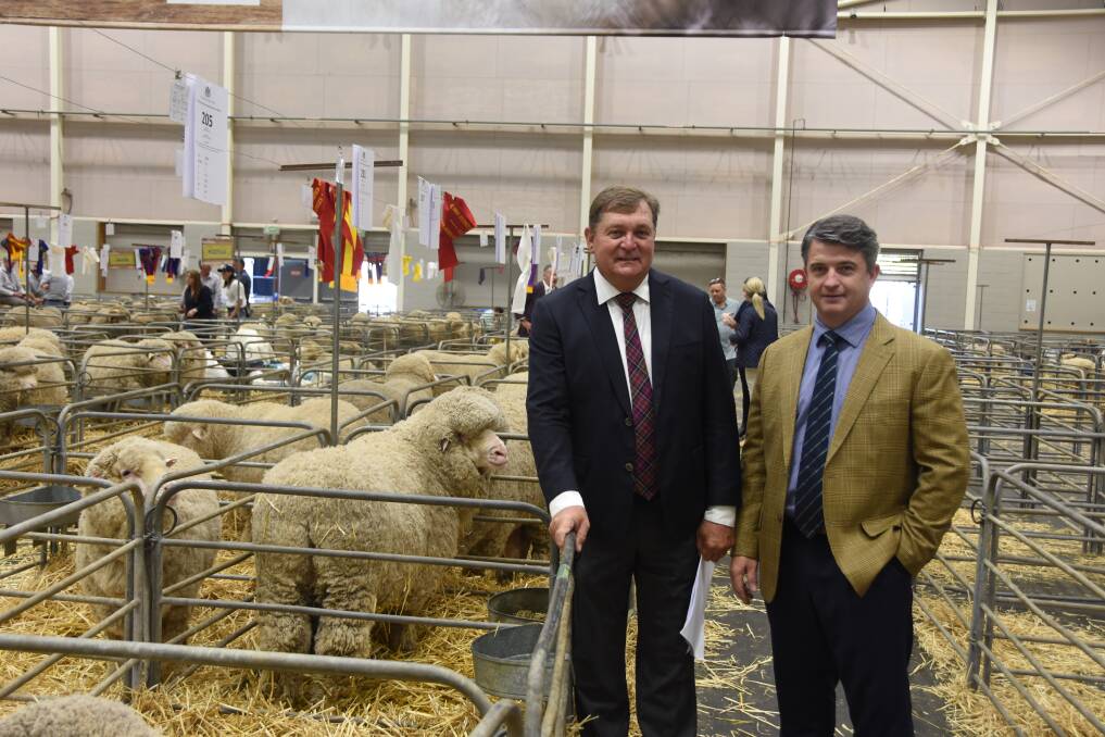 Don MacDonald, MacDonald Wool Brokers, Dubbo with Joshua Lamb, Endeavour Wool Exports. Photo by Helen De Costa. 