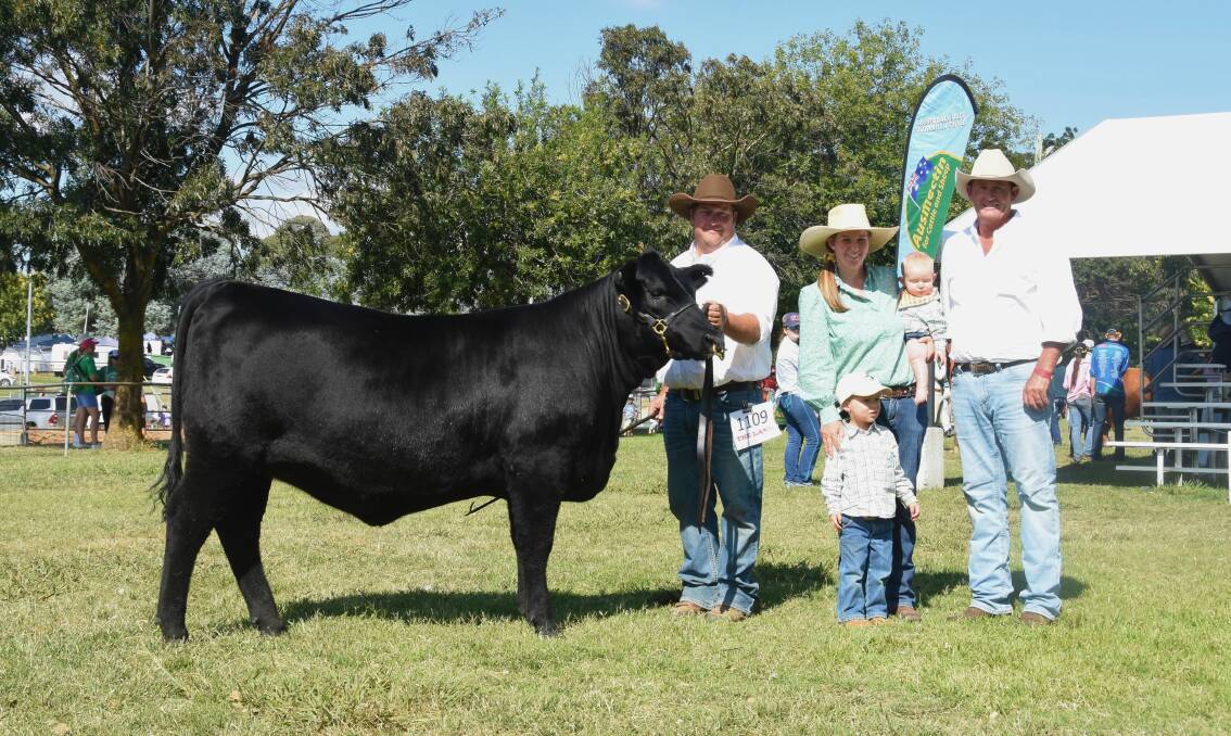 Top-priced animal Summit Bara U29 with Hayden, Jasmine, Arthur and James Green, Summit Livestock, Uranquinty and Scott Myers, H Francis and Co, Wagga Wagga. Photo by Helen De Costa. 