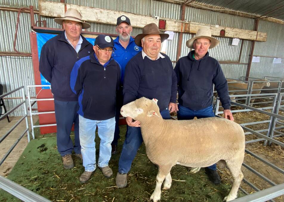 The top-priced ram which sold to Loloma Partnership, Tallwood, for $2100 with (back) Lindsay Fryer, AWN Orange, Chris Roweth, Windy Hill Poll Dorsets, and (front) Steve Pascoe, David Pascoe, and Jason Ponds, Loloma Partnership. Photo supplied. 