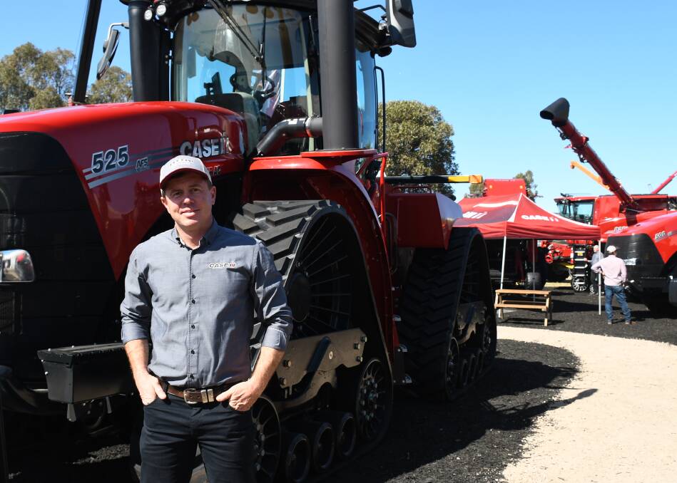 Case IH product manager for high horsepower tractors Justin Bryant with the new Steiger tractor launched at AgQuip 2023. Picture Paula Thompson