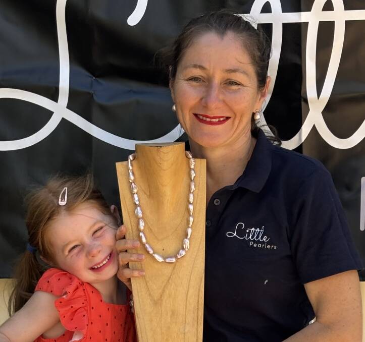 Chelsea Smith of Little Pearlers with daughter, Mary, and a natural freshwater baroque pearl necklace. Picture supplied