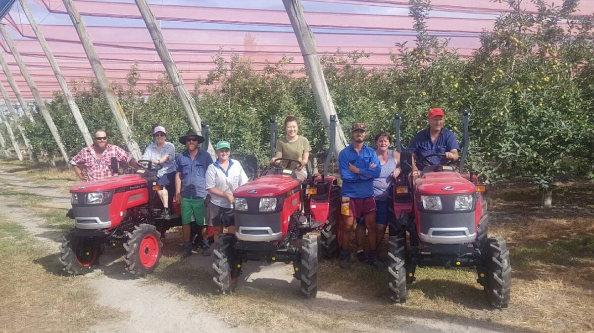 SHE'LL BE APPLES: Members of the Savio Orchards team, based in Stanthorpe Queensland, take delivery of five new Mahindra 2025 Jivo tractors for use in their apple operation. 