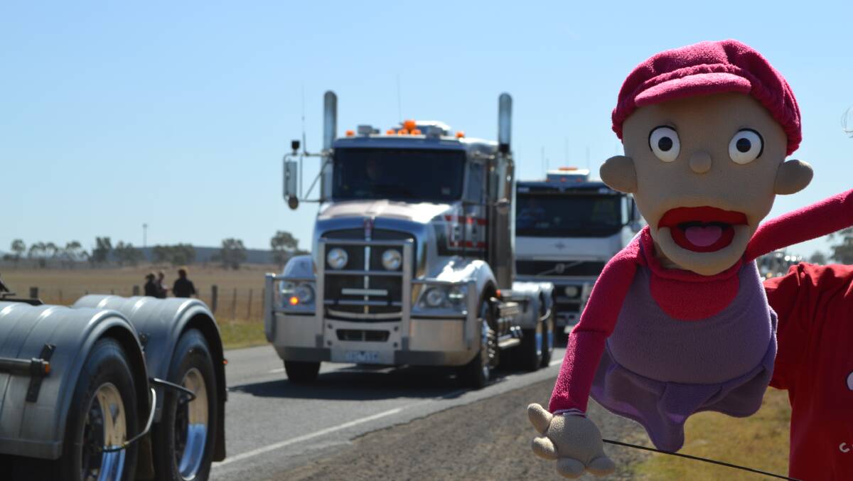 SMILE FOR THE CAMERA: Hundreds of trucks turned out to support Camp Quality in a convoy held in Geelong, Vic. 