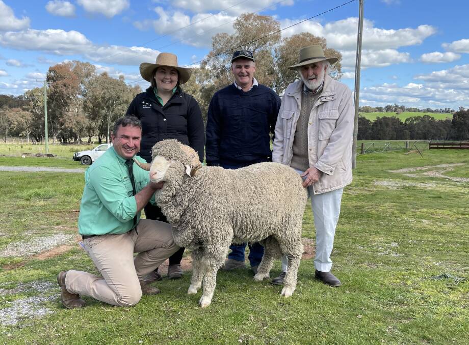 Top price - Tim Woodham and Ally Jaffrey, Nutrien stud stock, buyer Michael Lowe, Crookwell with vendor Winston McDonald. Photo: supplied

