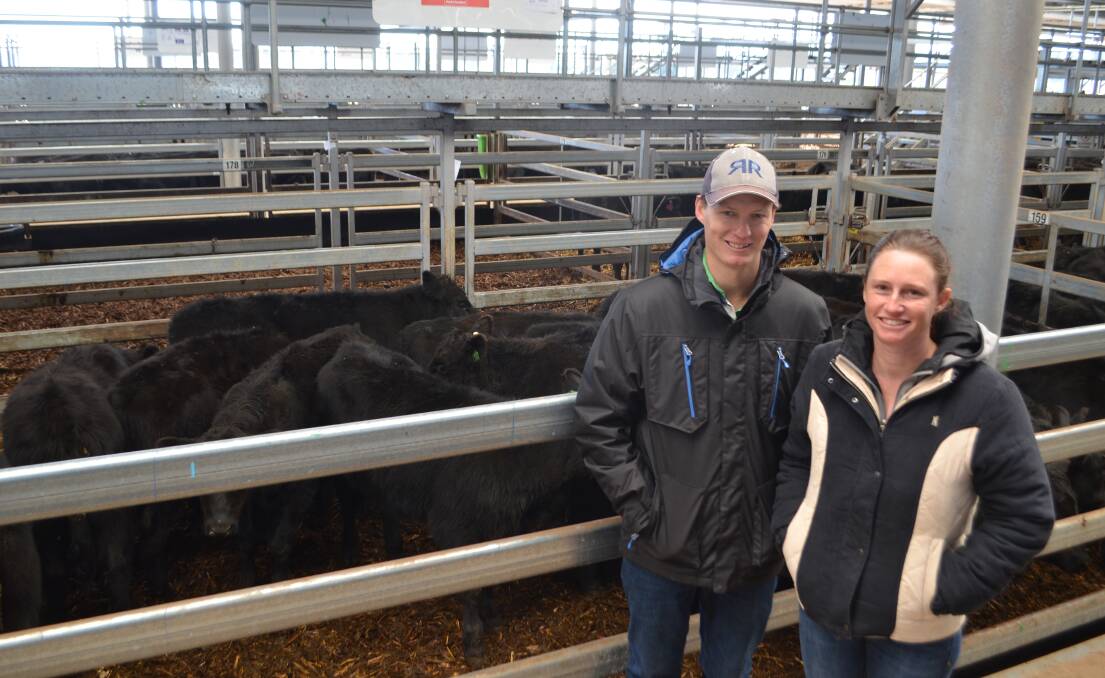 Justin and Diana Carter, Friedrich Farming Pty Ltd, Gerogery with their pen of 20 Angus weaner steers, weighing 261kg which sold for $875
