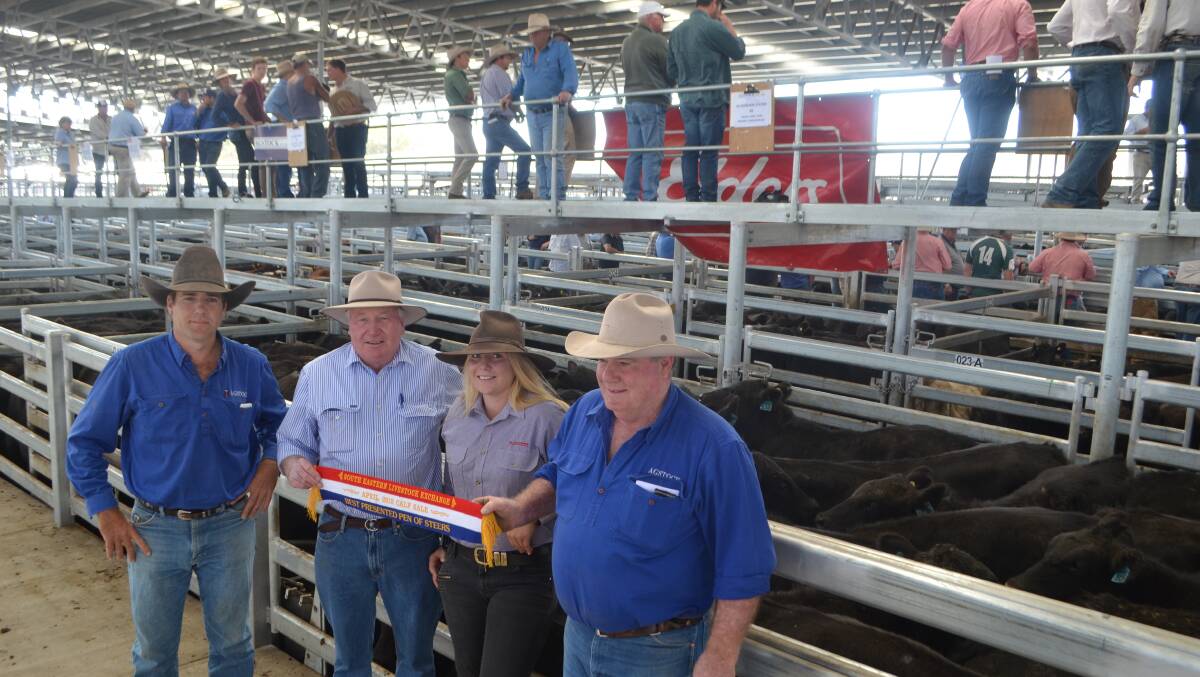 AgStock, Gundagai agents Nathan and John Sheahan flank Bundarbo Station, Jugiong manager Jim Renshaw and jillaroo Courtney Cleeland, in front of the Best Presented Pen of Steers