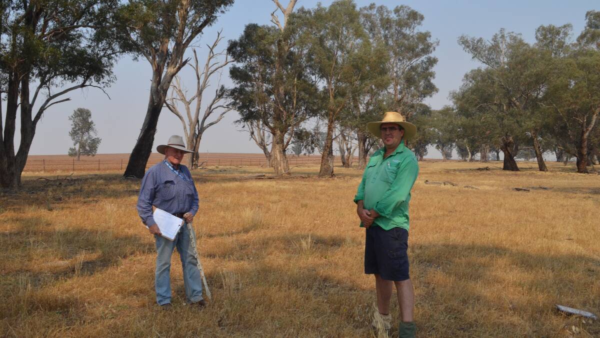 Brian Marshall, an Holistic Management educator and a program Verifier based at Guyra with landholder Chris Main preparing the evaluation of ten monitoring sites at his property Retreat, near Dirnaseer.