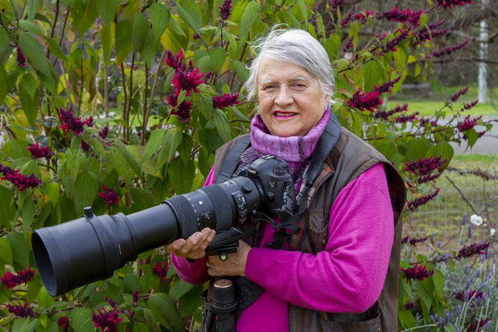 Margie McClelland with her Canon 5D Mark 111 with a Sigma 150-600 lens in the family garden in Hay. Photo: Chris McClelland