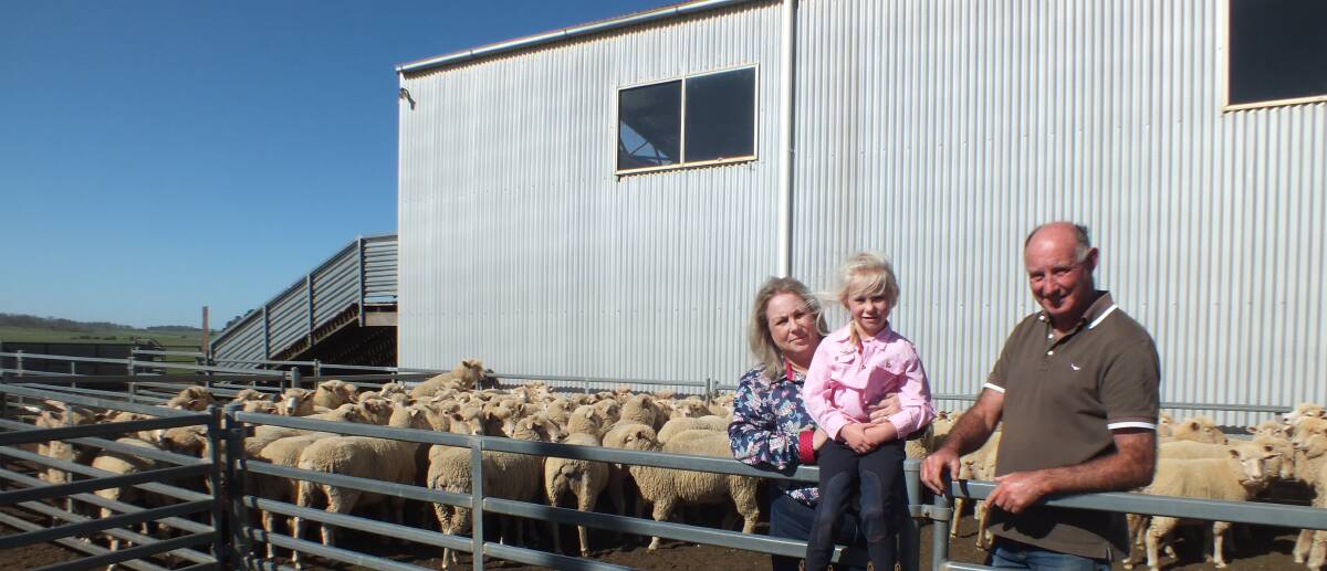 Jennifer, Montana and Ken Hewitt with their 103 cross-bred ewes sold for $401. Photo: Krisi Frost