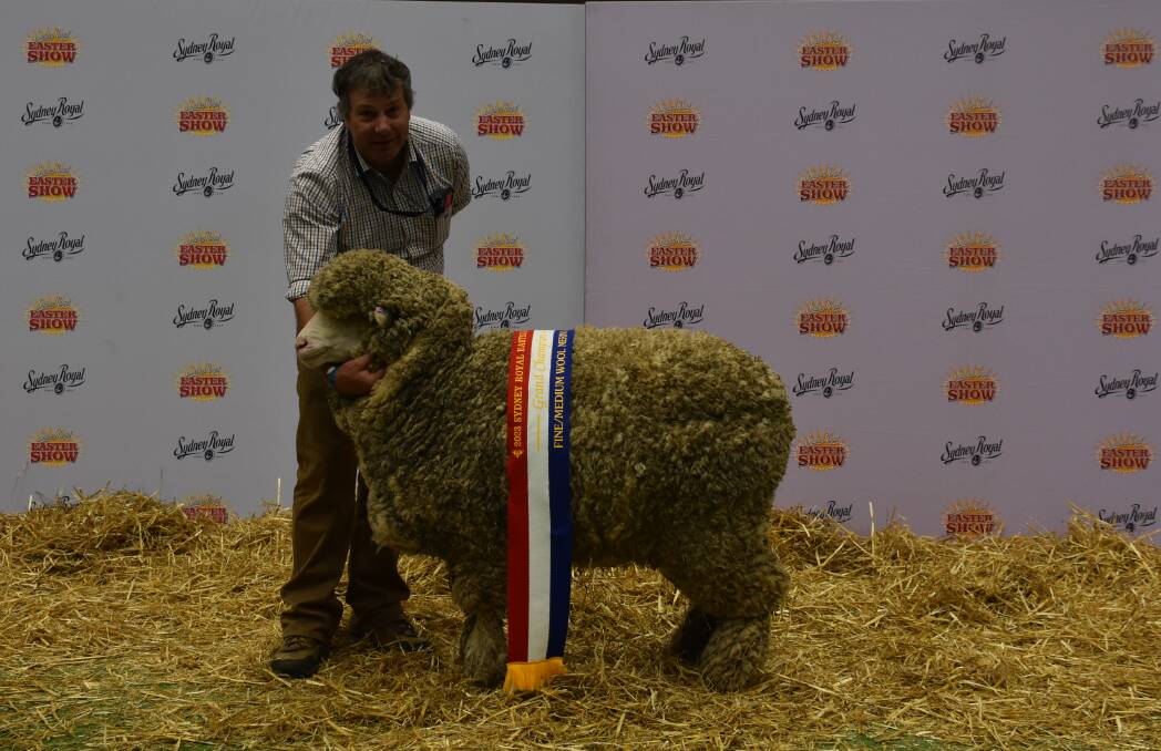 James Barron, Adina, Peak View, with his grand champion fine medium wool ewe. Photo: Julie Barron
