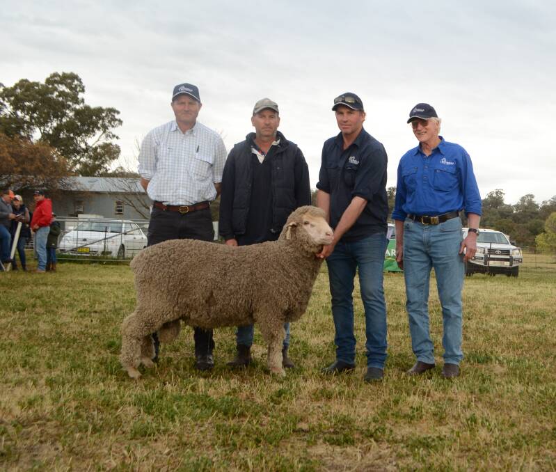 Stud consultant, Jason Southwell, ram buyer Brendan Stoney, Young, with vendors Rick and Ross Baldwin and the top priced ram at $6500 bought by Mr Stoney.
