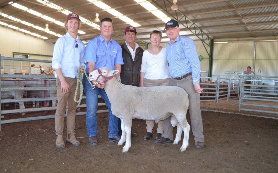 Jono Male, Aberdeen Poll Dorsets, Henty, Craig McLachlan, Newbold Poll Dorsets, Gawler River, SA, Simon Male, Aberdeen Poll Dorsets, Henty, with Bill and Angela Close, Newbold Poll Dorsets, Gawler River, SA with their top priced purchase at $18,000.