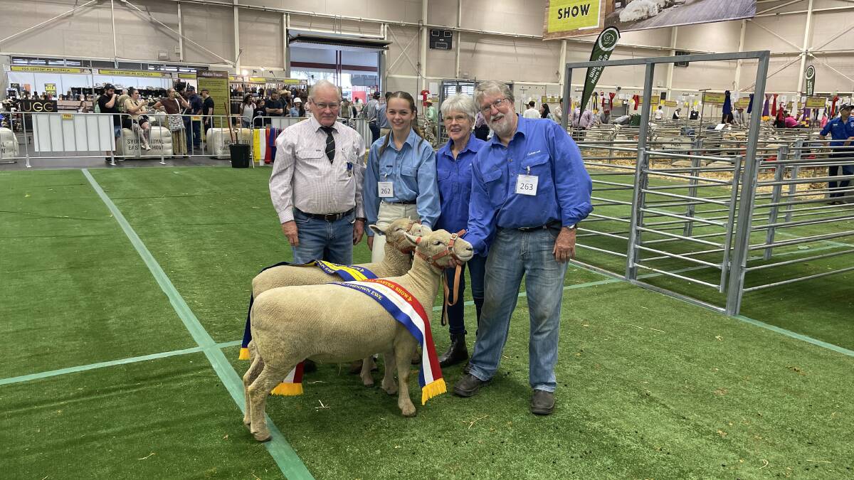 Judge Kelvin Cronk, Old Junee, Grace Hoffman and breeders Jeanette Webster and Ross Wilson, Cotties Run, Bathurst, with the reserve grand and grand champion Southdown ewes. 