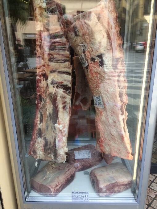 Chiania cuts on display in a restaurant window. Pride was shown in the native breed producing meat with flavour and fat cover. 